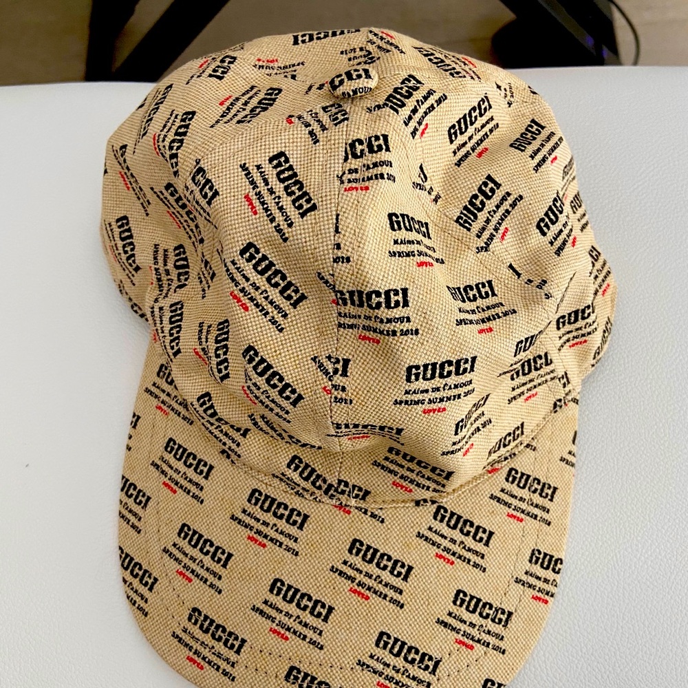 Authentic Gucci Hat come with dust bag in excellent condition